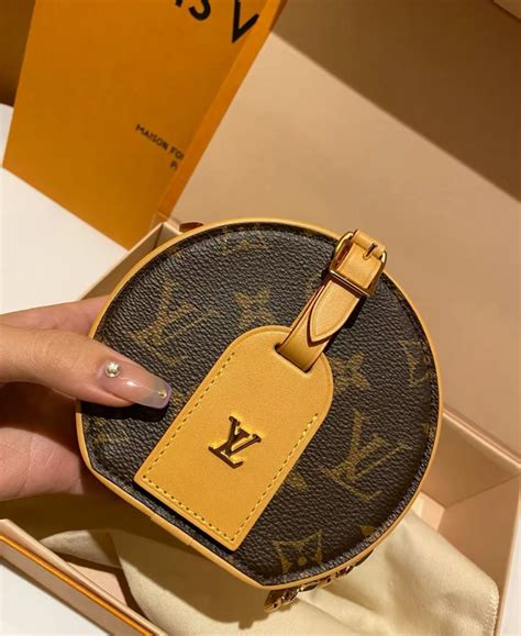 louis vuitton bun bag with gold zipper|Louis Vuitton tote bag price.